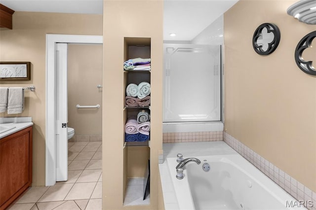 900 Danforth St, Alton, IL 62002 - full bathroom featuring a tub with jets, tile patterned floors, and vanity