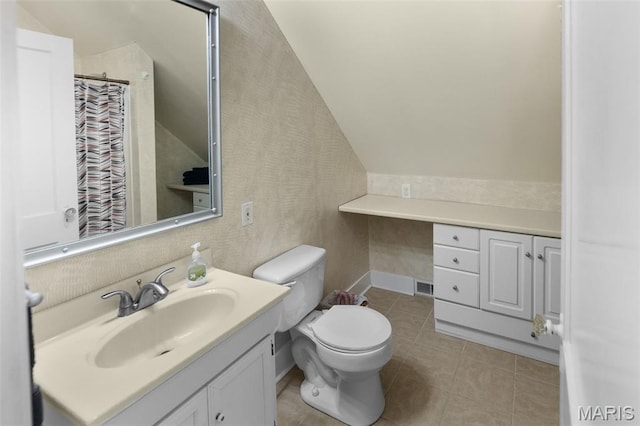900 Danforth St, Alton, IL 62002 - full bath with lofted ceiling, vanity, tile patterned flooring, wallpapered walls, and curtained shower