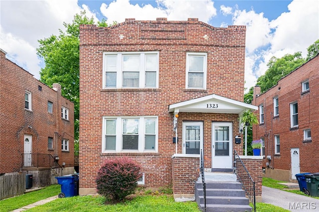 1323 Woodland Dr, Saint Louis, MO 63117 - view of front of house with brick siding