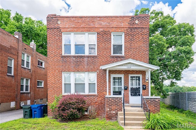 1323 Woodland Dr, Saint Louis, MO 63117 - view of front of property with brick siding