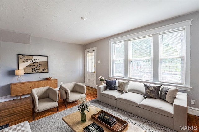 1323 Woodland Dr, Saint Louis, MO 63117 - living area featuring wood finished floors and baseboards