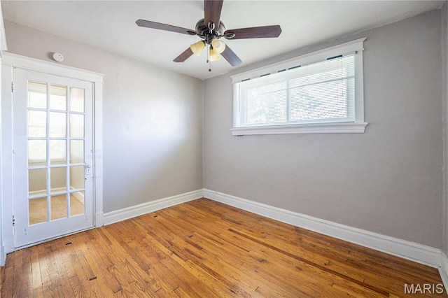 1323 Woodland Dr, Saint Louis, MO 63117 - empty room featuring wood finished floors and a ceiling fan