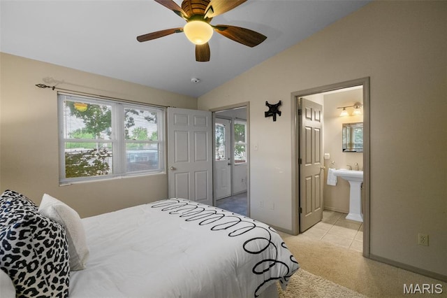 4950 Eichelberger St, Saint Louis, MO 63109 - bedroom with lofted ceiling, ensuite bathroom, light colored carpet, a ceiling fan, and light tile patterned floors