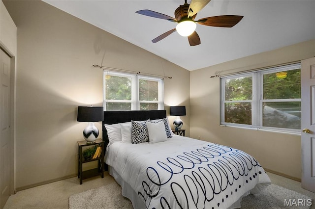 4950 Eichelberger St, Saint Louis, MO 63109 - carpeted bedroom featuring lofted ceiling, multiple windows, and a ceiling fan