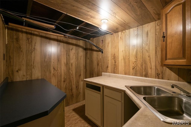 4950 Eichelberger St, Saint Louis, MO 63109 - kitchen with wooden walls and light countertops