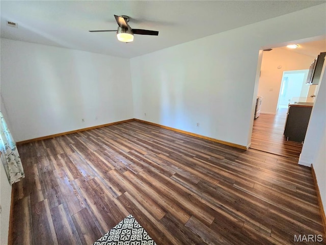 411 Williams St, Bethalto, IL 62010 - unfurnished room featuring dark wood finished floors and ceiling fan