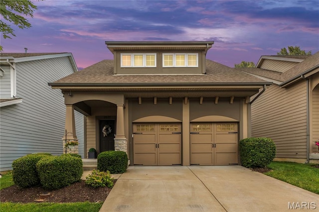 2625 Grover Crossing Way, Wildwood, MO 63040 - view of front facade featuring concrete driveway, covered porch, and roof with shingles