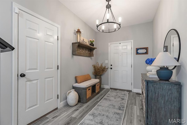 2625 Grover Crossing Way, Wildwood, MO 63040 - entrance foyer with a chandelier and light wood-style flooring