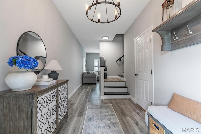 2625 Grover Crossing Way, Wildwood, MO 63040 - foyer with a chandelier, wood finished floors, and stairway