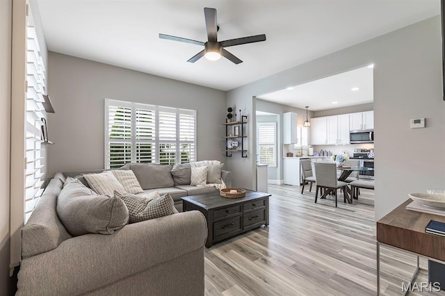 2625 Grover Crossing Way, Wildwood, MO 63040 - living area with ceiling fan, light wood-style flooring, and recessed lighting