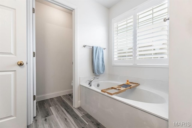 2625 Grover Crossing Way, Wildwood, MO 63040 - full bathroom with a garden tub and wood finished floors