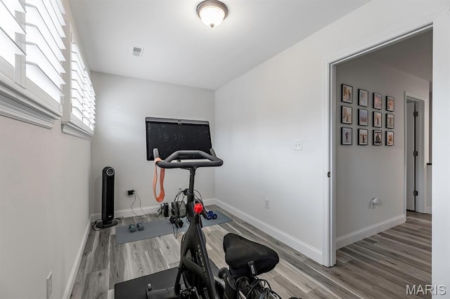 2625 Grover Crossing Way, Wildwood, MO 63040 - exercise area featuring wood finished floors and baseboards