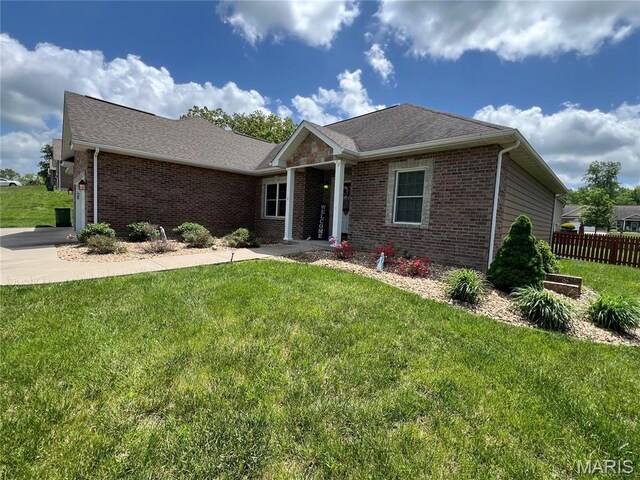 306 Traci Dawn Dr, Rolla, MO 65401 - ranch-style home featuring brick siding and a garage