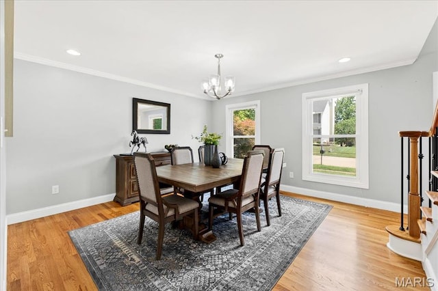 16544 Willow Glen Dr, Wildwood, MO 63040 - dining area with a chandelier, ornamental molding, light wood-style flooring, and recessed lighting