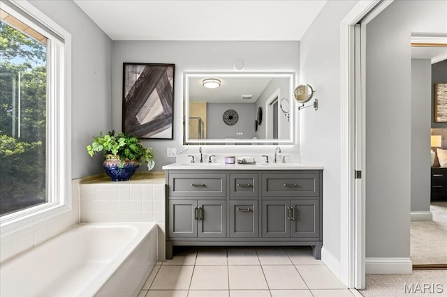16544 Willow Glen Dr, Wildwood, MO 63040 - full bath featuring double vanity, a bath, and tile patterned floors