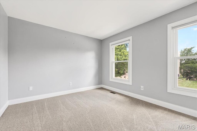 16544 Willow Glen Dr, Wildwood, MO 63040 - empty room featuring carpet floors and baseboards