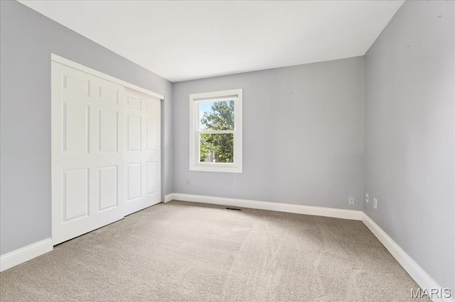 16544 Willow Glen Dr, Wildwood, MO 63040 - unfurnished bedroom featuring carpet floors and a closet
