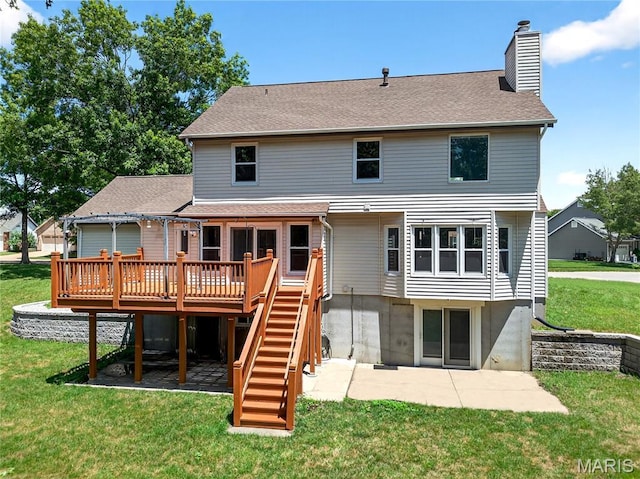 16544 Willow Glen Dr, Wildwood, MO 63040 - back of property with a chimney, a wooden deck, a patio area, a lawn, and stairs