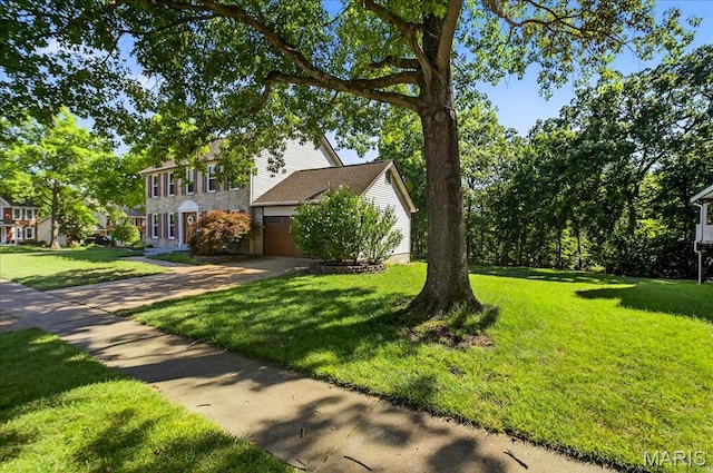 16544 Willow Glen Dr, Wildwood, MO 63040 - view of front of house with a front yard and concrete driveway