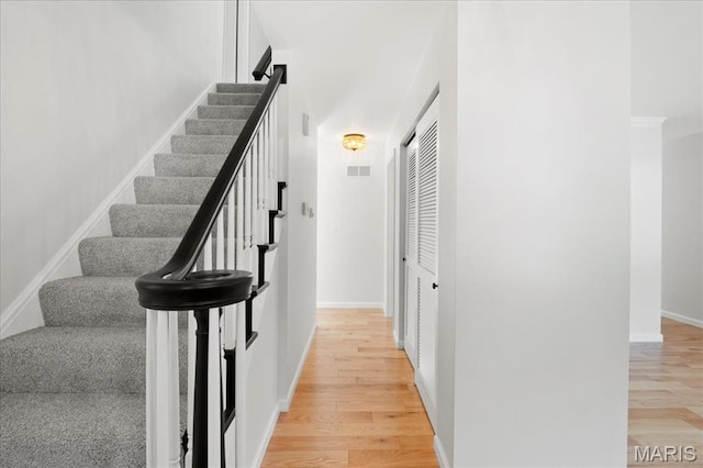 15371 Timber Hill Ln, Chesterfield, MO 63017 - staircase with wood finished floors