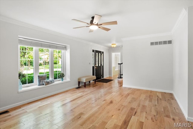 15371 Timber Hill Ln, Chesterfield, MO 63017 - spare room with crown molding, ceiling fan, and light wood finished floors