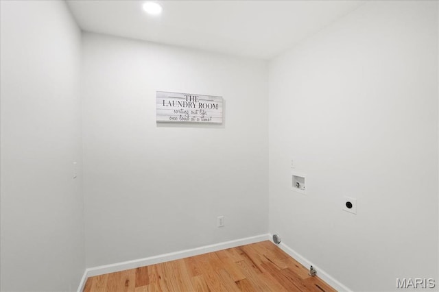 15371 Timber Hill Ln, Chesterfield, MO 63017 - laundry area featuring washer hookup, hookup for an electric dryer, light wood finished floors, recessed lighting, and gas dryer hookup