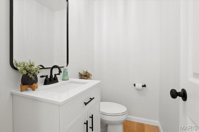 15371 Timber Hill Ln, Chesterfield, MO 63017 - half bathroom with vanity and wood finished floors