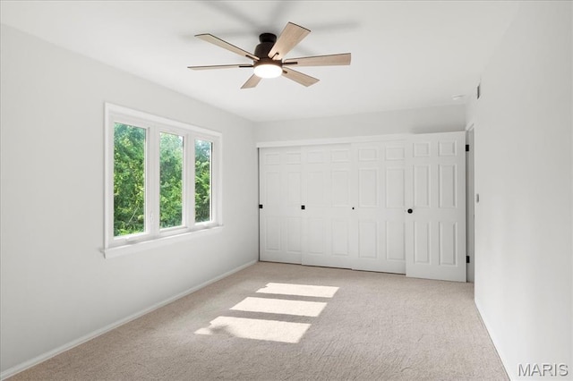 15371 Timber Hill Ln, Chesterfield, MO 63017 - unfurnished bedroom with light colored carpet, a closet, and ceiling fan