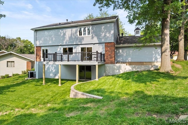 15371 Timber Hill Ln, Chesterfield, MO 63017 - back of house with a wooden deck and a lawn