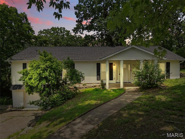 6905 Scenic View Dr, Cedar Hill, MO 63016 - view of front facade with covered porch, a yard, and roof with shingles