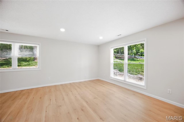 6905 Scenic View Dr, Cedar Hill, MO 63016 - spare room featuring light wood finished floors and recessed lighting