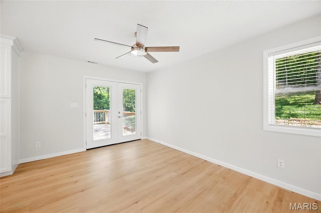 6905 Scenic View Dr, Cedar Hill, MO 63016 - unfurnished room featuring ceiling fan, light wood finished floors, and french doors