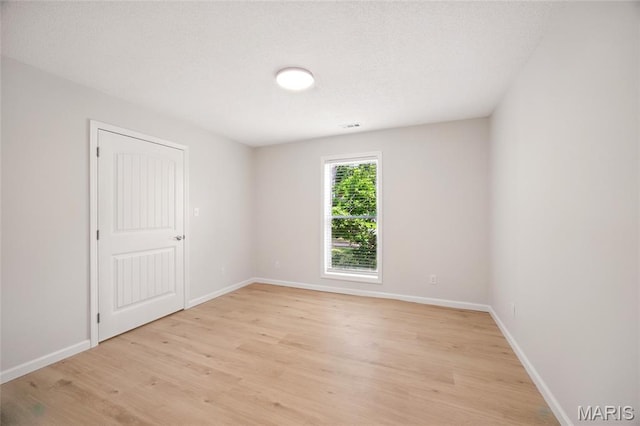 6905 Scenic View Dr, Cedar Hill, MO 63016 - spare room featuring light wood finished floors and baseboards