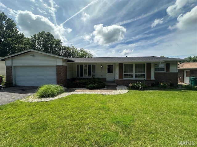 11939 Lakecrest Ln, Saint Louis, MO 63138 - ranch-style house with brick siding, asphalt driveway, an attached garage, and a front yard