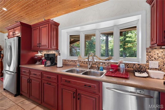 2402 Ripley Rte Unit A, Doniphan, MO 63935 - kitchen with stainless steel appliances, wooden ceiling, tasteful backsplash, dark brown cabinets, and light tile patterned floors