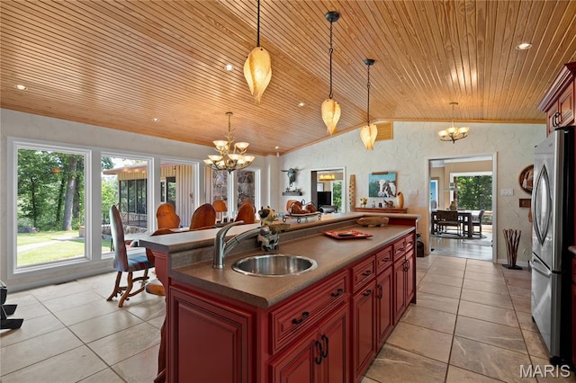 2402 Ripley Rte Unit A, Doniphan, MO 63935 - kitchen featuring freestanding refrigerator, wood ceiling, a chandelier, lofted ceiling, and dark countertops