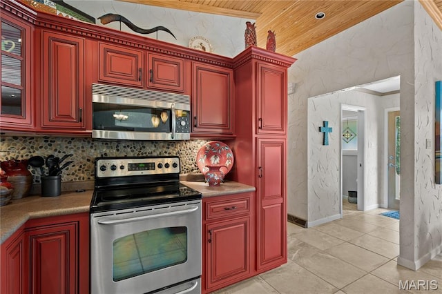 2402 Ripley Rte Unit A, Doniphan, MO 63935 - kitchen featuring stainless steel appliances, dark brown cabinets, decorative backsplash, light tile patterned floors, and wooden ceiling