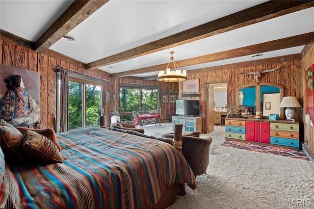 2402 Ripley Rte Unit A, Doniphan, MO 63935 - carpeted bedroom featuring wooden walls, beamed ceiling, and a chandelier