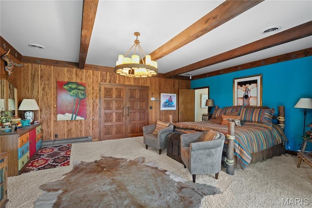2402 Ripley Rte Unit A, Doniphan, MO 63935 - carpeted bedroom featuring a chandelier, beam ceiling, a baseboard radiator, and wooden walls