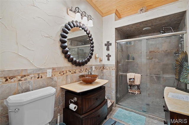 2402 Ripley Rte Unit A, Doniphan, MO 63935 - full bathroom with vanity, tile walls, wood ceiling, a stall shower, and wainscoting