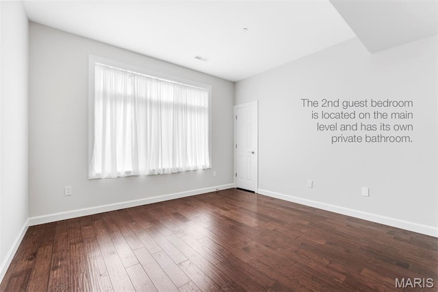 110 N Newstead Ave Unit 303, Saint Louis, MO 63108 - unfurnished room featuring wood finished floors and baseboards
