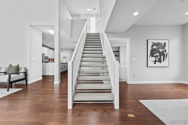 110 N Newstead Ave Unit 303, Saint Louis, MO 63108 - stairs with wood finished floors and recessed lighting