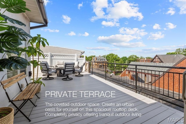 110 N Newstead Ave Unit 303, Saint Louis, MO 63108 - wooden deck with outdoor dining space