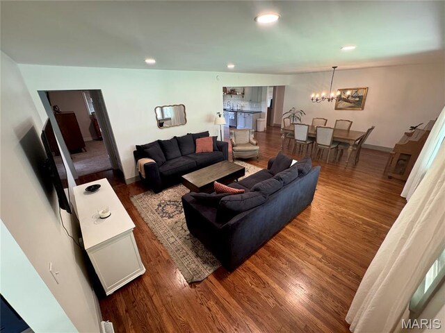1311 W Line St, Palmyra, MO 63461 - living area with a chandelier, wood finished floors, and recessed lighting
