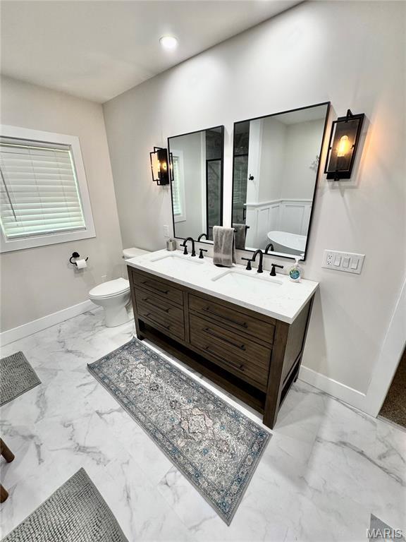 1311 W Line St, Palmyra, MO 63461 - full bathroom featuring marble finish flooring and double vanity