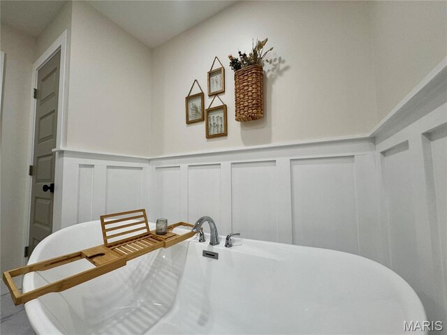 1311 W Line St, Palmyra, MO 63461 - dining room featuring a decorative wall and wainscoting
