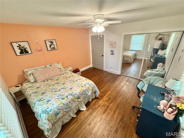 1311 W Line St, Palmyra, MO 63461 - bedroom featuring wood finished floors, a ceiling fan, and a closet