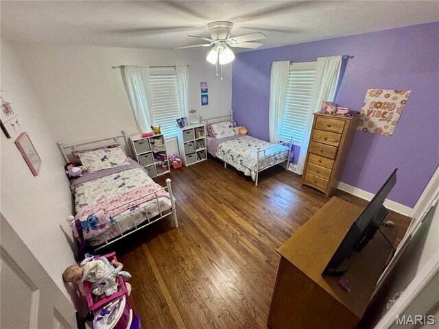 1311 W Line St, Palmyra, MO 63461 - bedroom with wood finished floors and ceiling fan