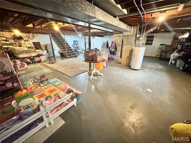 1311 W Line St, Palmyra, MO 63461 - unfinished basement featuring gas water heater and stairs