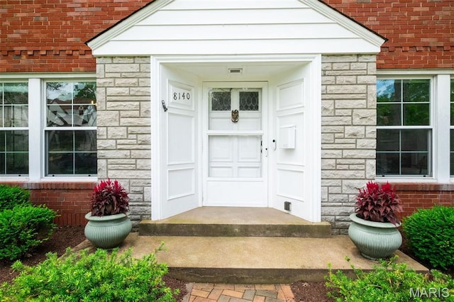 8140 Pershing Ave, Clayton, MO 63105 - view of exterior entry with brick siding and stone siding